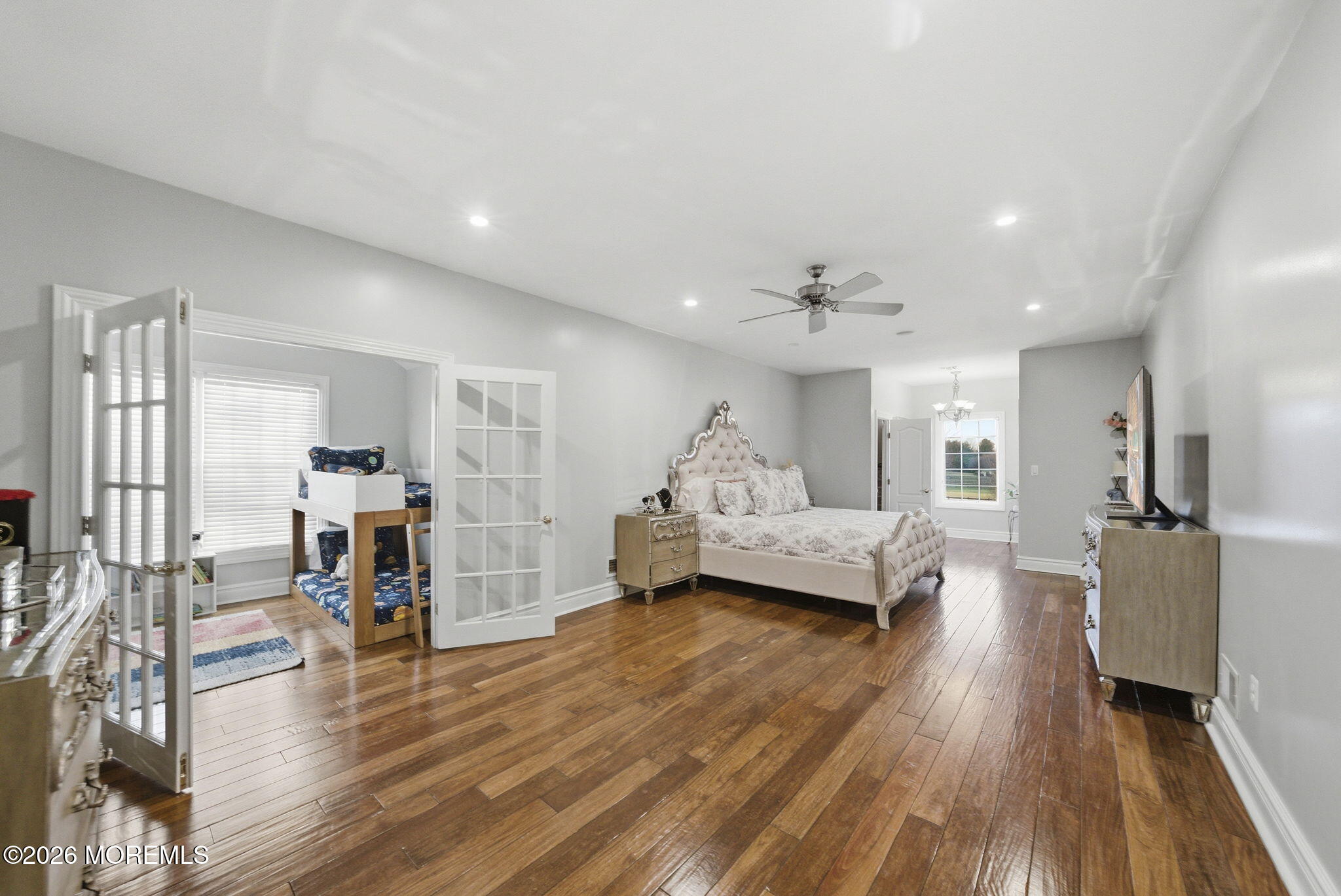 4 Squan Song Lane Colts Neck, NJ 07722 - Photo 27 of 45 a living room with furniture and a wooden floor