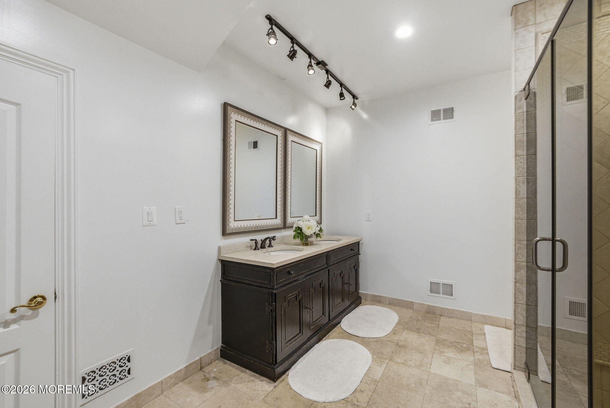4 Squan Song Lane Colts Neck, NJ 07722 - Photo 28 of 45 a bathroom with a toilet sink and mirror