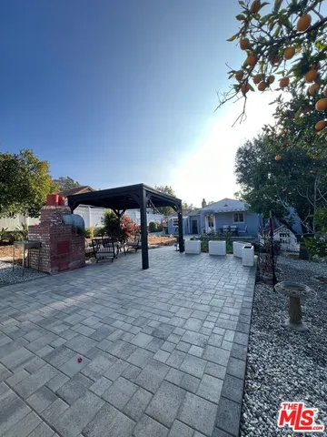 a view of a car park in front of house