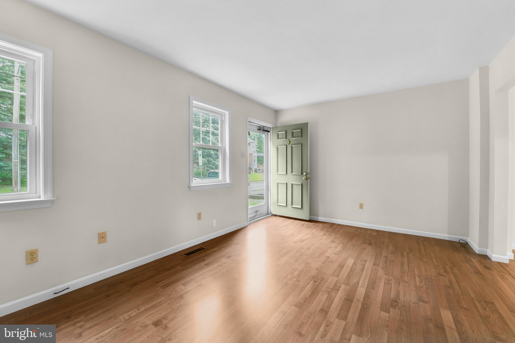 19 Reed Street Mohnton, PA 19540 - Photo 4 of 18 a view of an empty room with wooden floor and a window