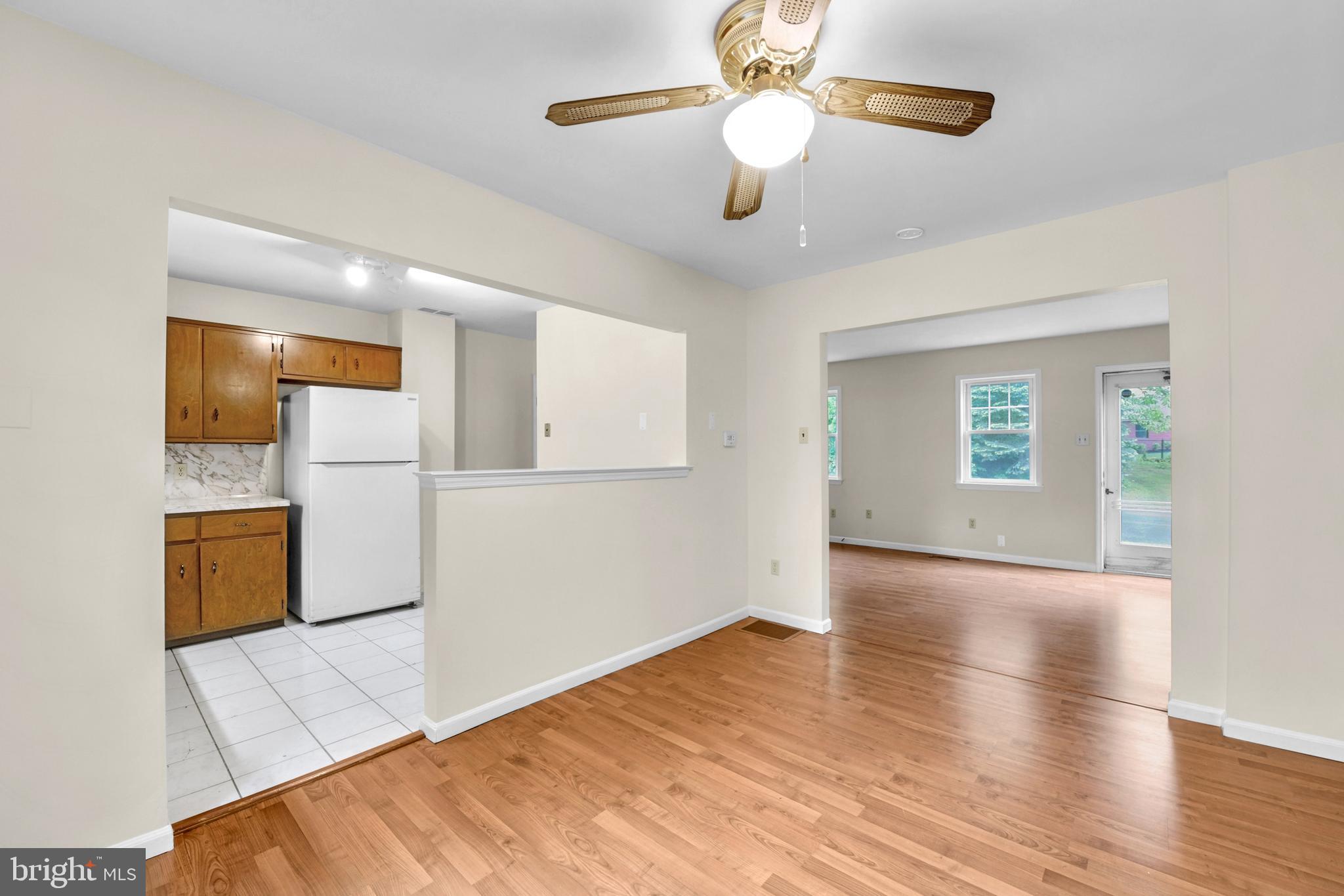 19 Reed Street Mohnton, PA 19540 - Photo 6 of 18 a view of empty room with wooden floor and ceiling fan