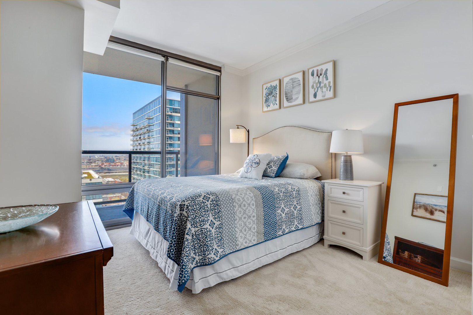 100 East 14th Street, Unit 1908 Chicago, IL 60605 - Photo 12 of 20 a bedroom with a bed and a desk