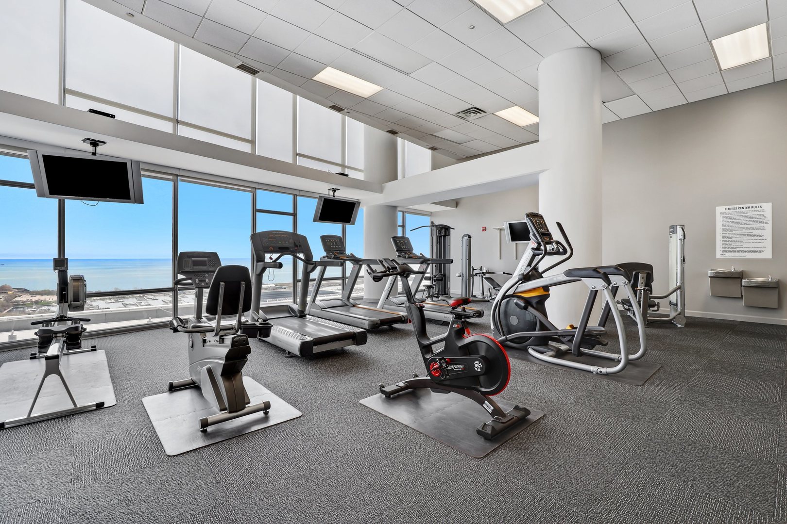 100 East 14th Street, Unit 1908 Chicago, IL 60605 - Photo 17 of 20 a view of a room with gym equipment