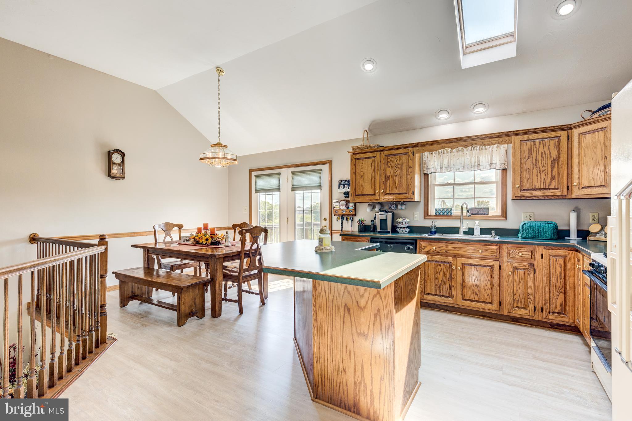 2255 Harney Road Littlestown, PA 17340 - Photo 13 of 50 Upper level eat in kitchen with deck