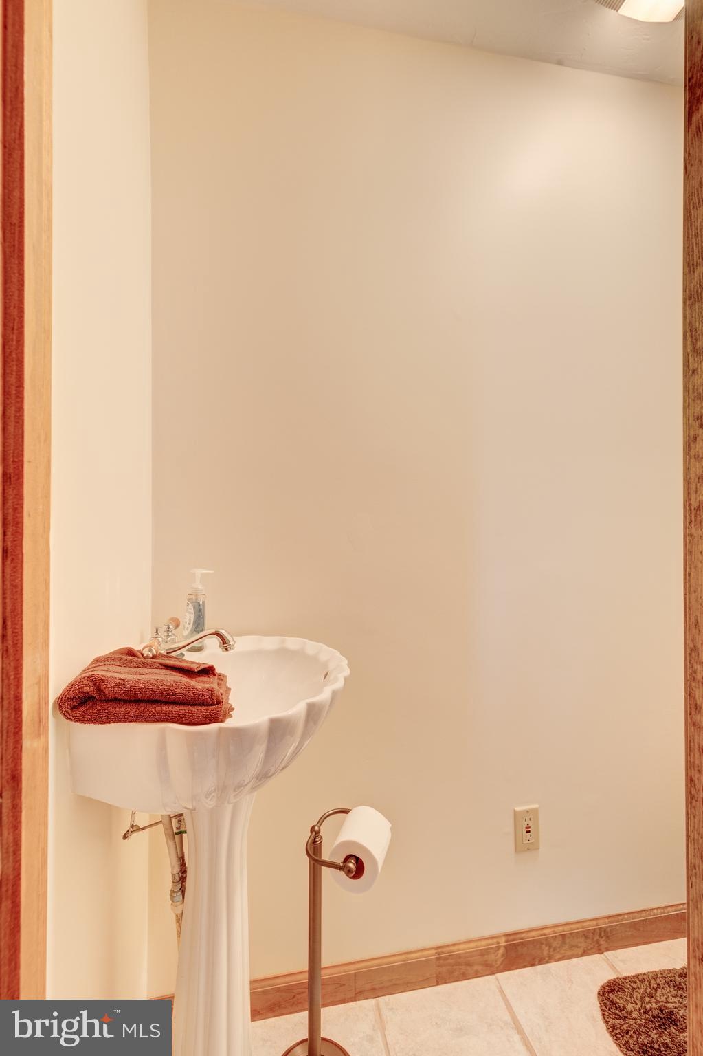 2255 Harney Road Littlestown, PA 17340 - Photo 24 of 50 3rd level powder room at rec room and den area
