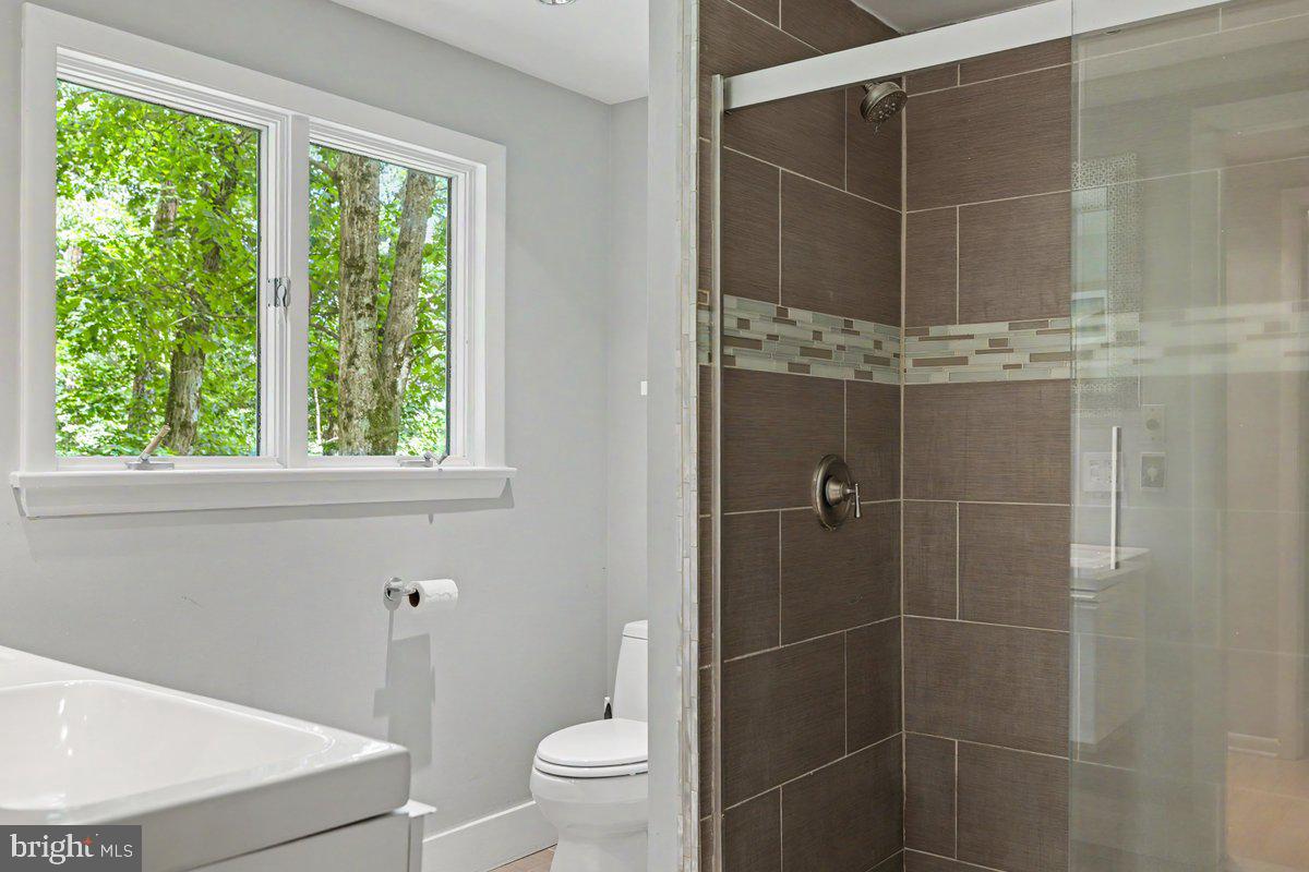 13 High Road New Hope, PA 18938 - Photo 30 of 56 a bathroom with a toilet and shower