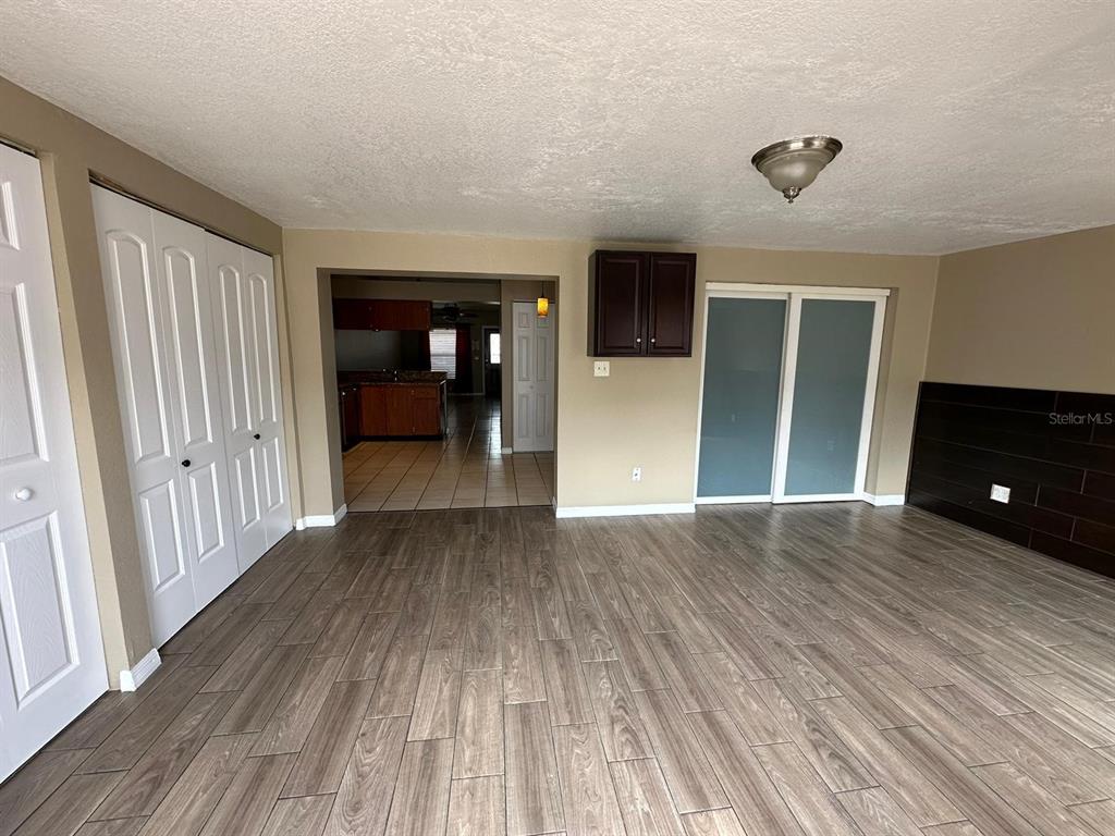1715 Oak Branch Court, Unit 1715 Brandon, FL 33511 - Photo 11 of 15 wooden floor in a hall with an entryway