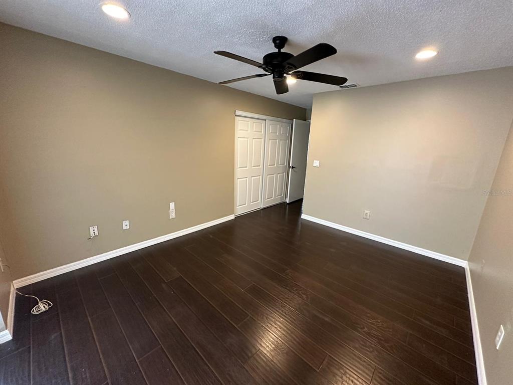 1715 Oak Branch Court, Unit 1715 Brandon, FL 33511 - Photo 7 of 15 wooden floor in an empty room