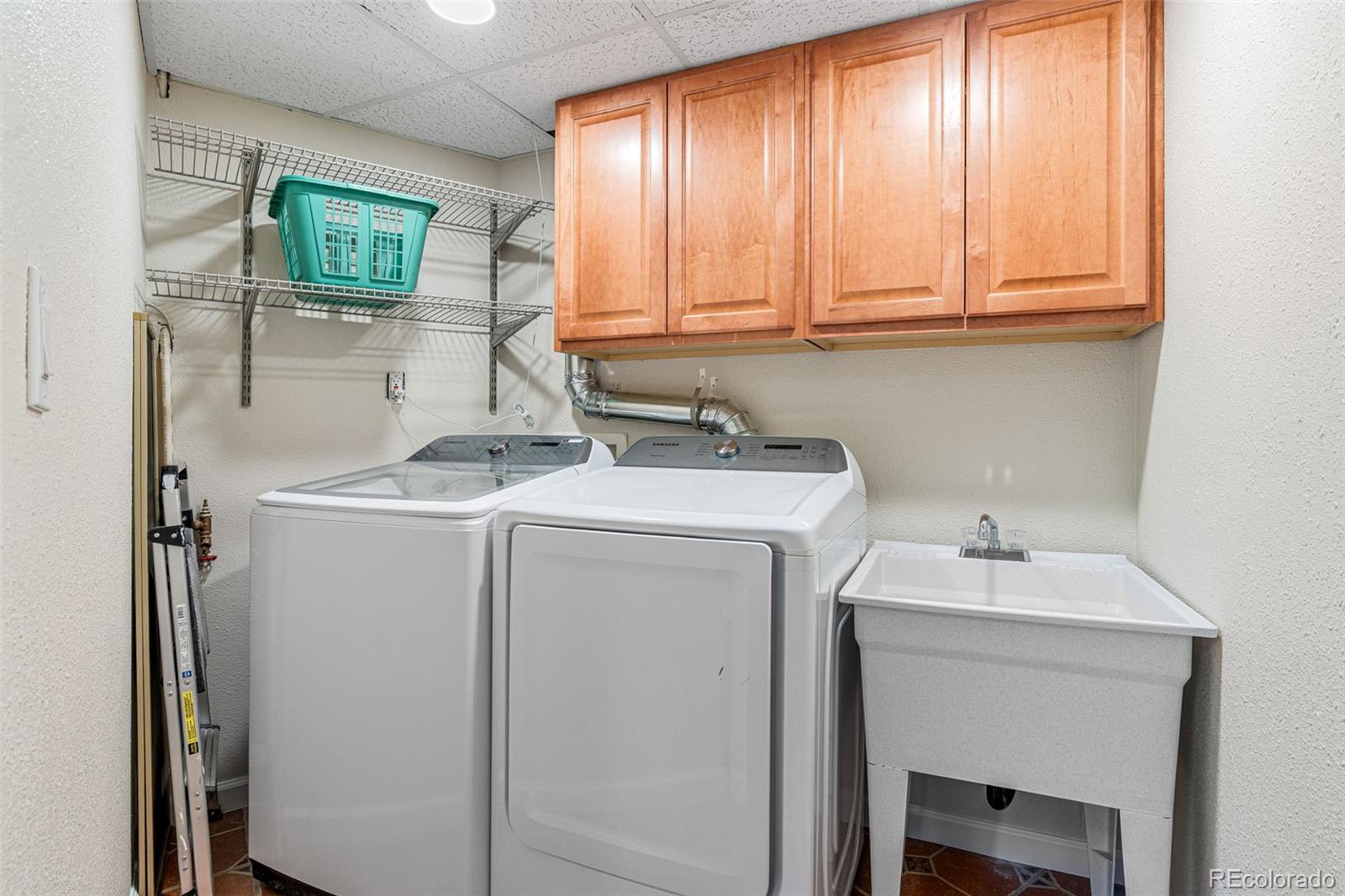 319 Camino Bosque Boulder, CO 80302 - Photo 34 of 44 a utility room with dryer and washer