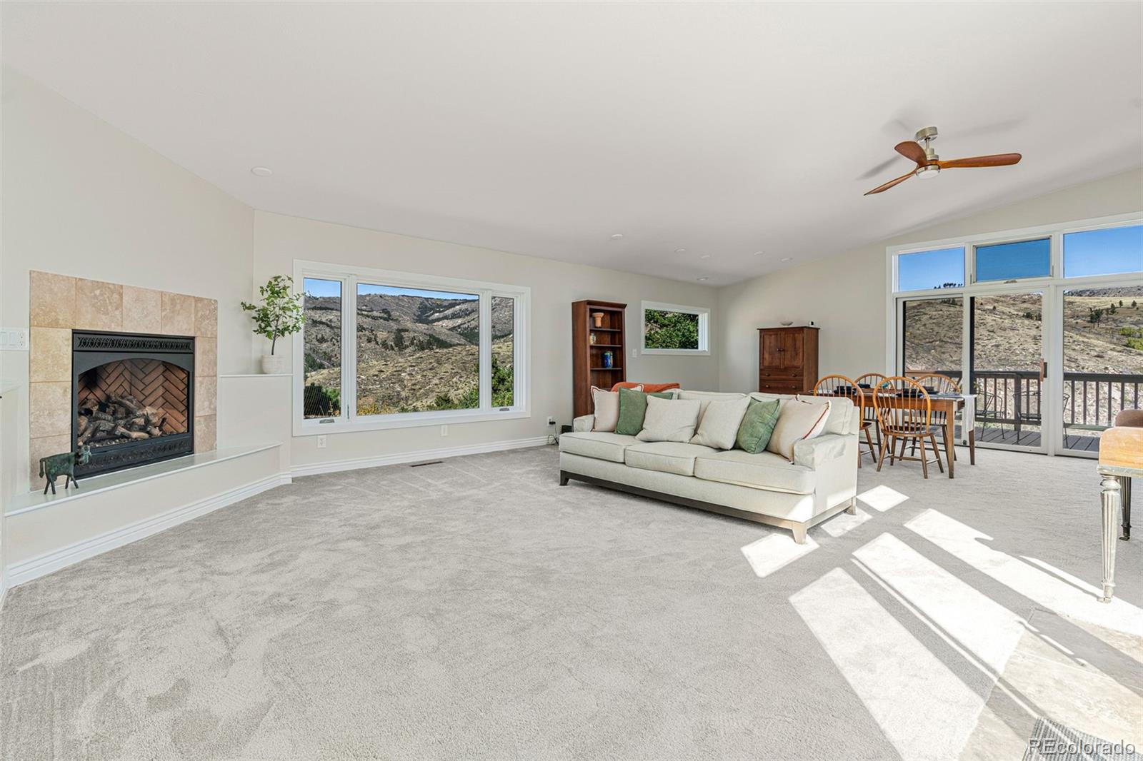 319 Camino Bosque Boulder, CO 80302 - Photo 6 of 44 a living room with furniture and a fireplace
