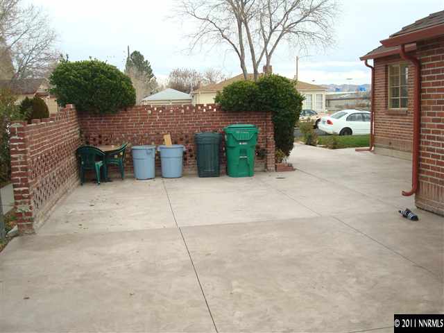 995 Wilkinson Avenue Reno, NV 89502 - Photo 12 of 12 a view of a house with a yard and a garage