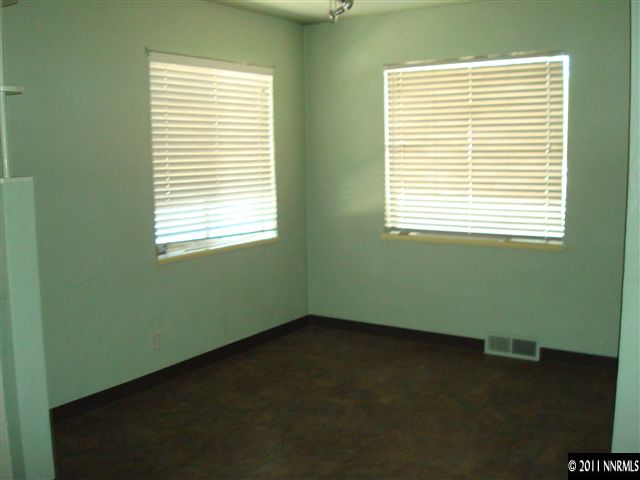 995 Wilkinson Avenue Reno, NV 89502 - Photo 5 of 12 a view of an empty room with a window