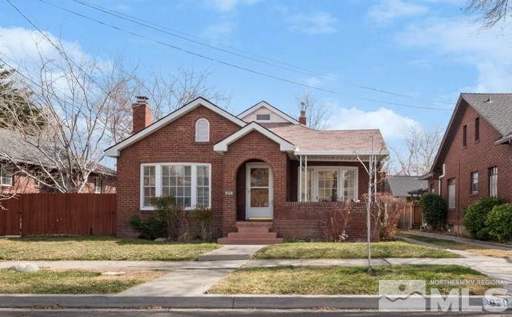 930 Nixon Avenue Reno, NV 89509 - Photo 1 of 27 a front view of a house with a yard