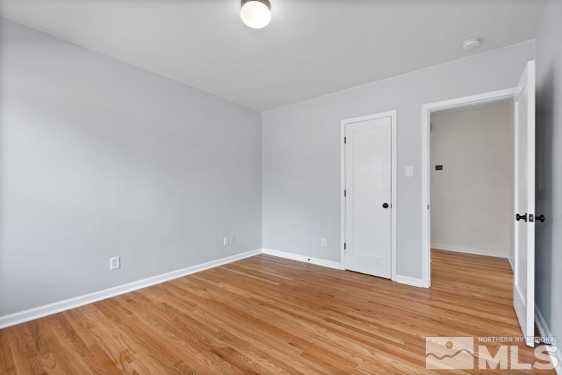 930 Nixon Avenue Reno, NV 89509 - Photo 17 of 27 a view of empty room with wooden floor