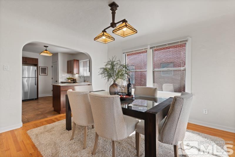 930 Nixon Avenue Reno, NV 89509 - Photo 8 of 27 a view of a dining room with furniture and a window