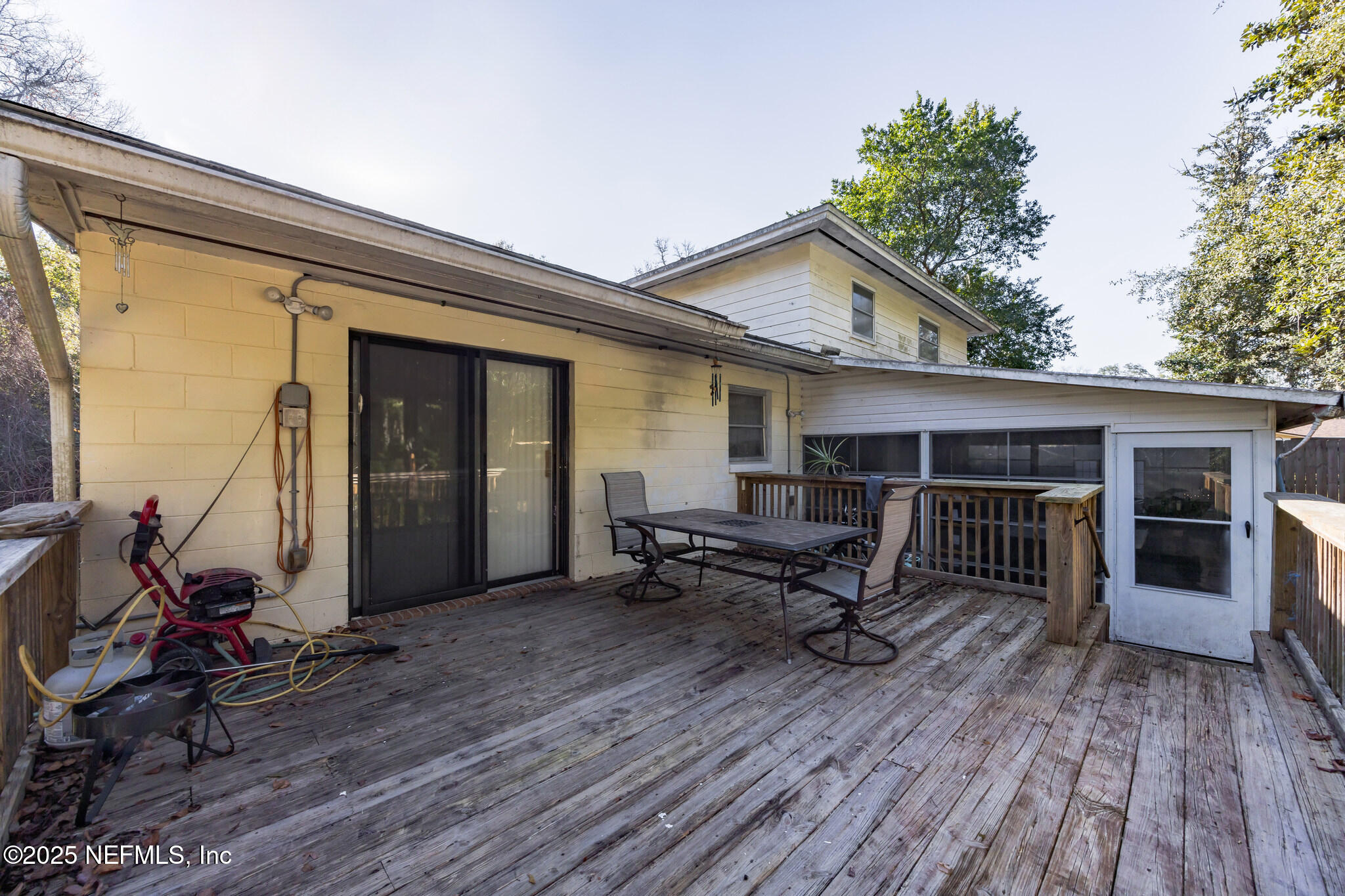 4134 Pine Road Orange Park, FL 32065 - Photo 23 of 30 a view of house with chair and tables