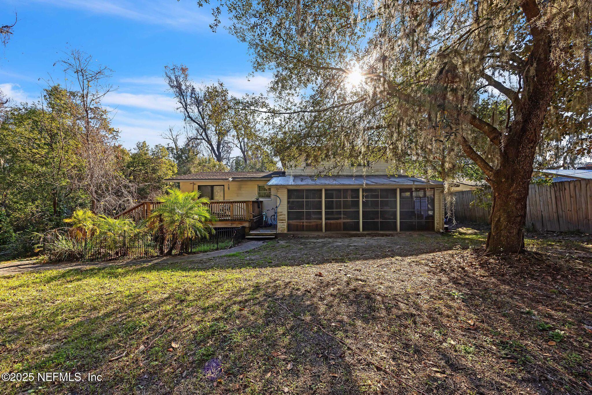 4134 Pine Road Orange Park, FL 32065 - Photo 29 of 30 a view of a yard in front of a house with large trees