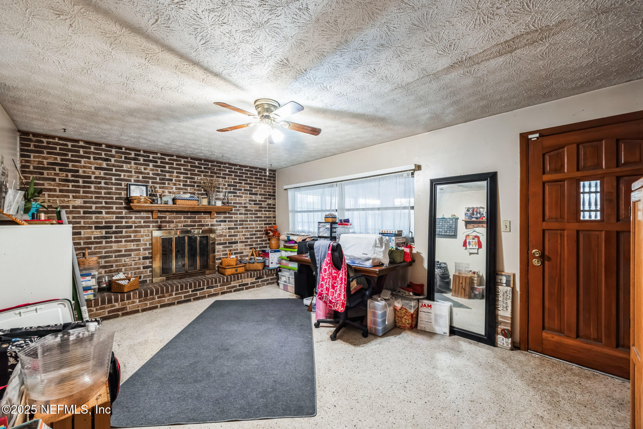 4134 Pine Road Orange Park, FL 32065 - Photo 6 of 30 a view of a room with gym equipment