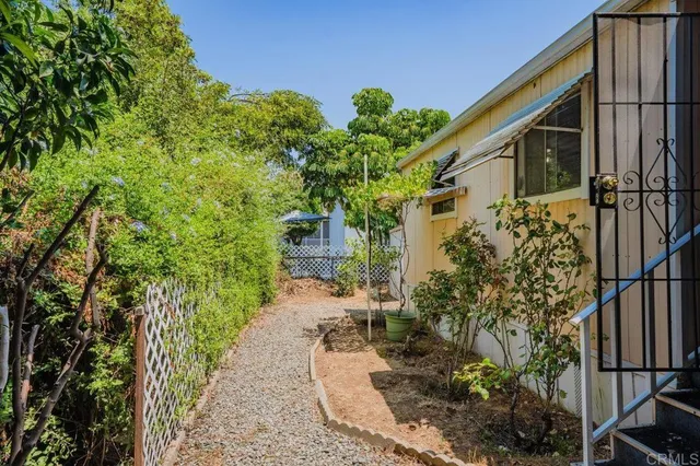 a backyard of a house with lots of green space