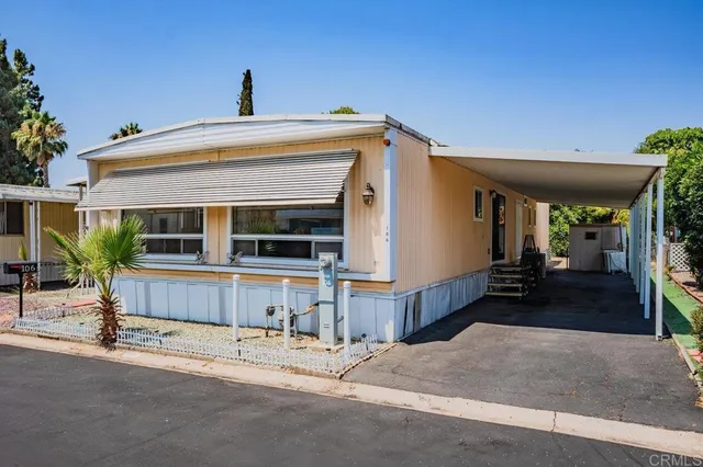 a front view of a house with a garage