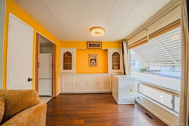 a view of livingroom with furniture and windows
