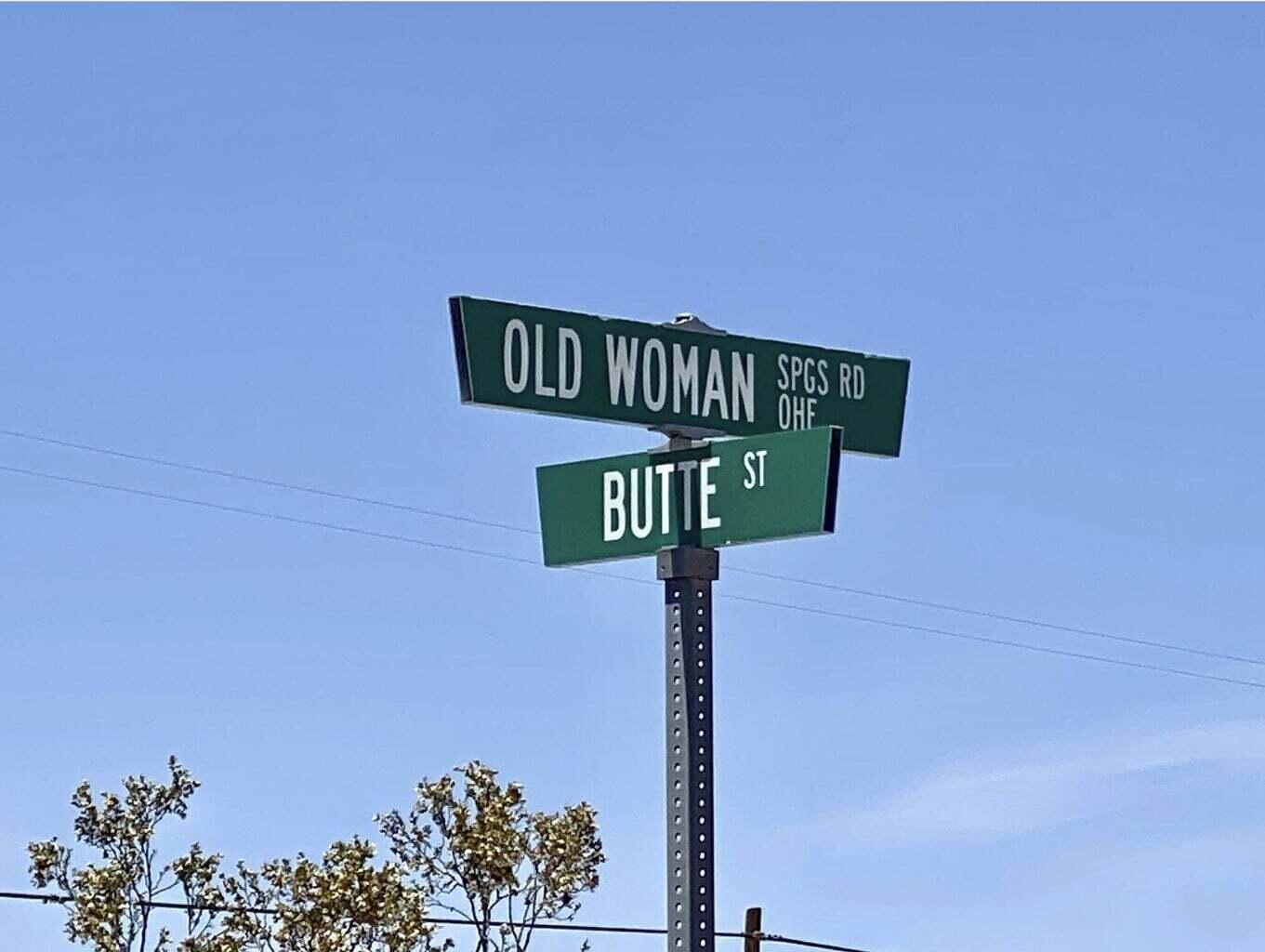 205 Old Woman Springs Road Yucca Valley, CA 92284 - Photo 33 of 33 a street sign on a pole