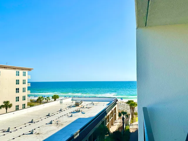 a view of an ocean from a balcony