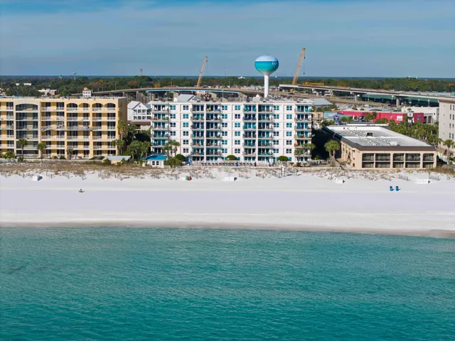 a view of a swimming pool with an outdoor space and seating area