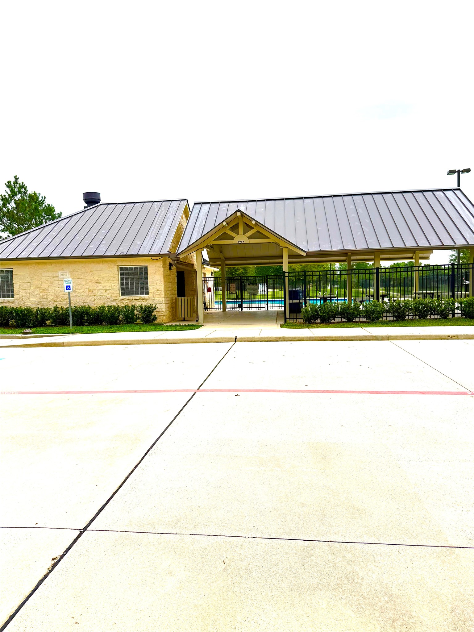 7046 Sliding Rock Circle Spring, TX 77379 - Photo 36 of 41 Discover a charming amenity center equipped with modern facilities, perfect for relaxation and recreation.