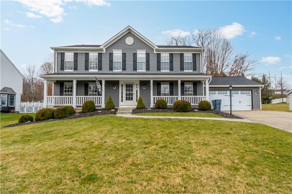 108 Western Cir Drive McDonald, PA 15057 - Photo 1 of 25 a front view of a house with a yard table and chairs
