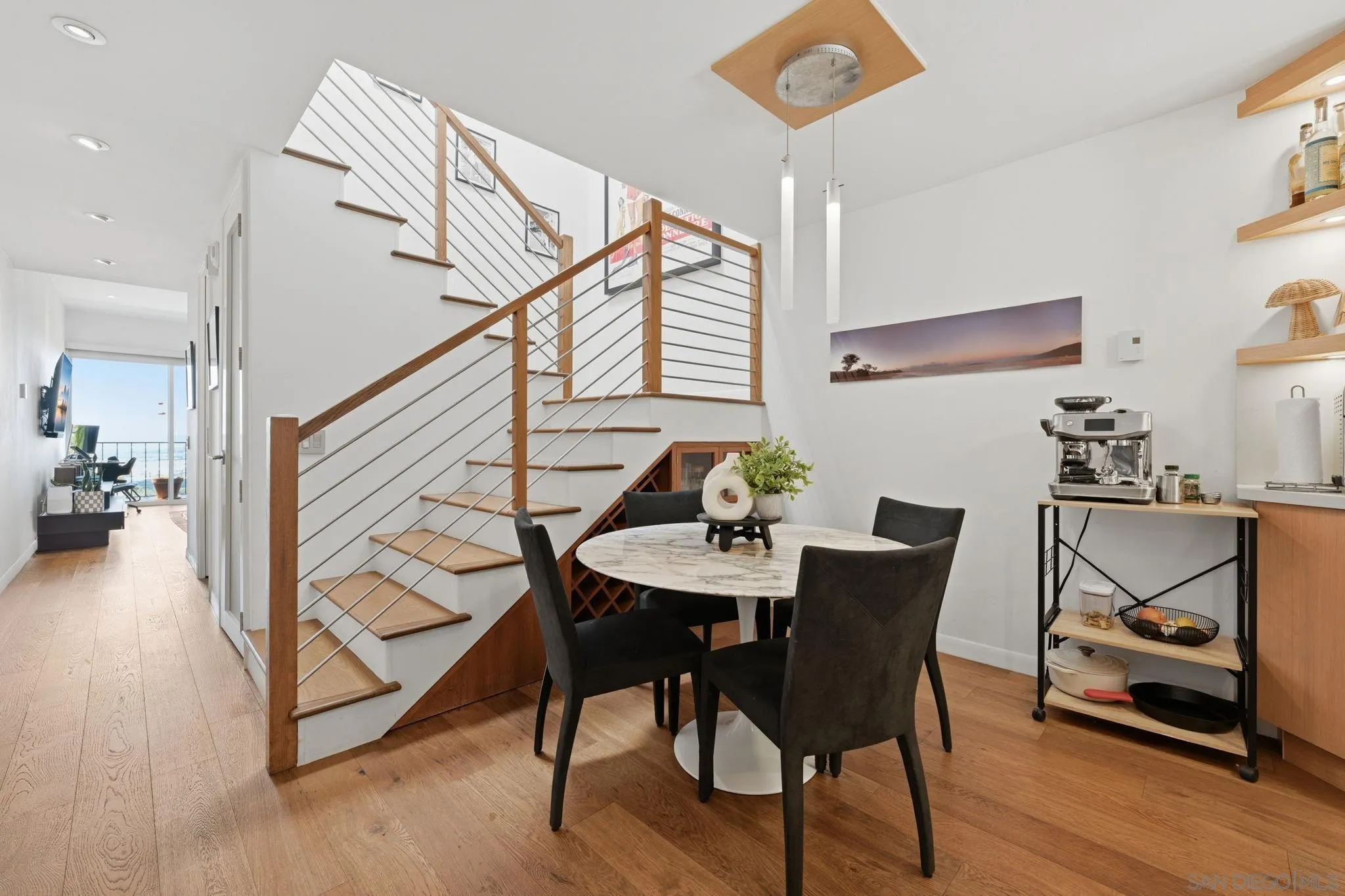 1663 Guy Street San Diego, CA 92103 - Photo 2 of 30 a view of a dining room with furniture and wooden floor