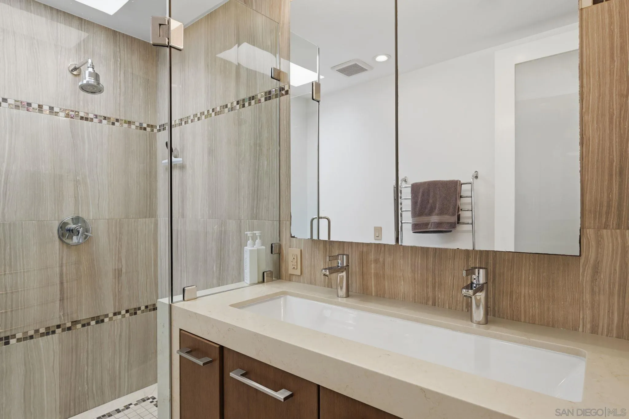 1663 Guy Street San Diego, CA 92103 - Photo 22 of 30 a bathroom with a sink and a mirror
