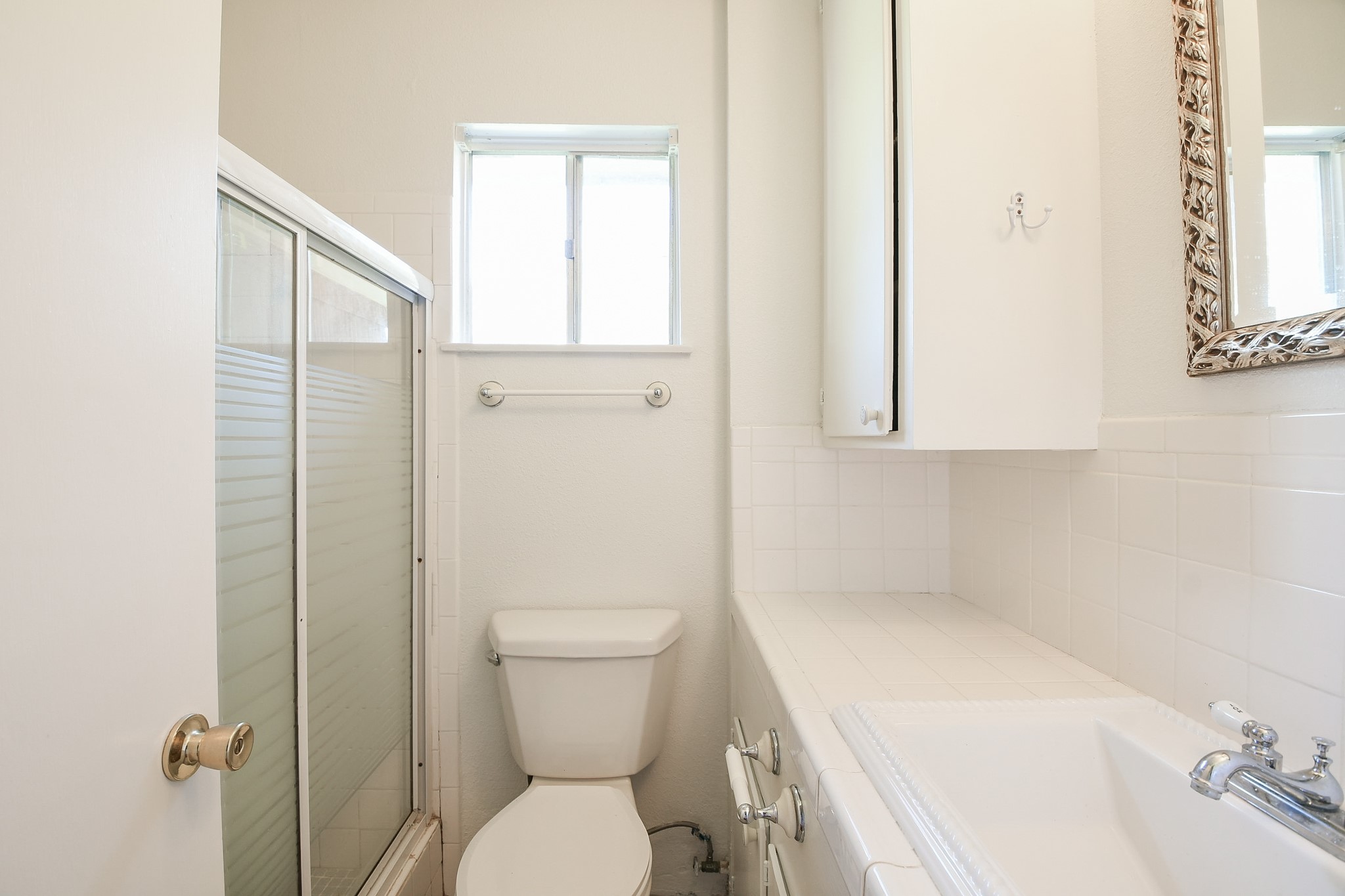 129 Cannon Street Clute, TX 77531 - Photo 23 of 28 a bathroom with a sink a toilet and shower