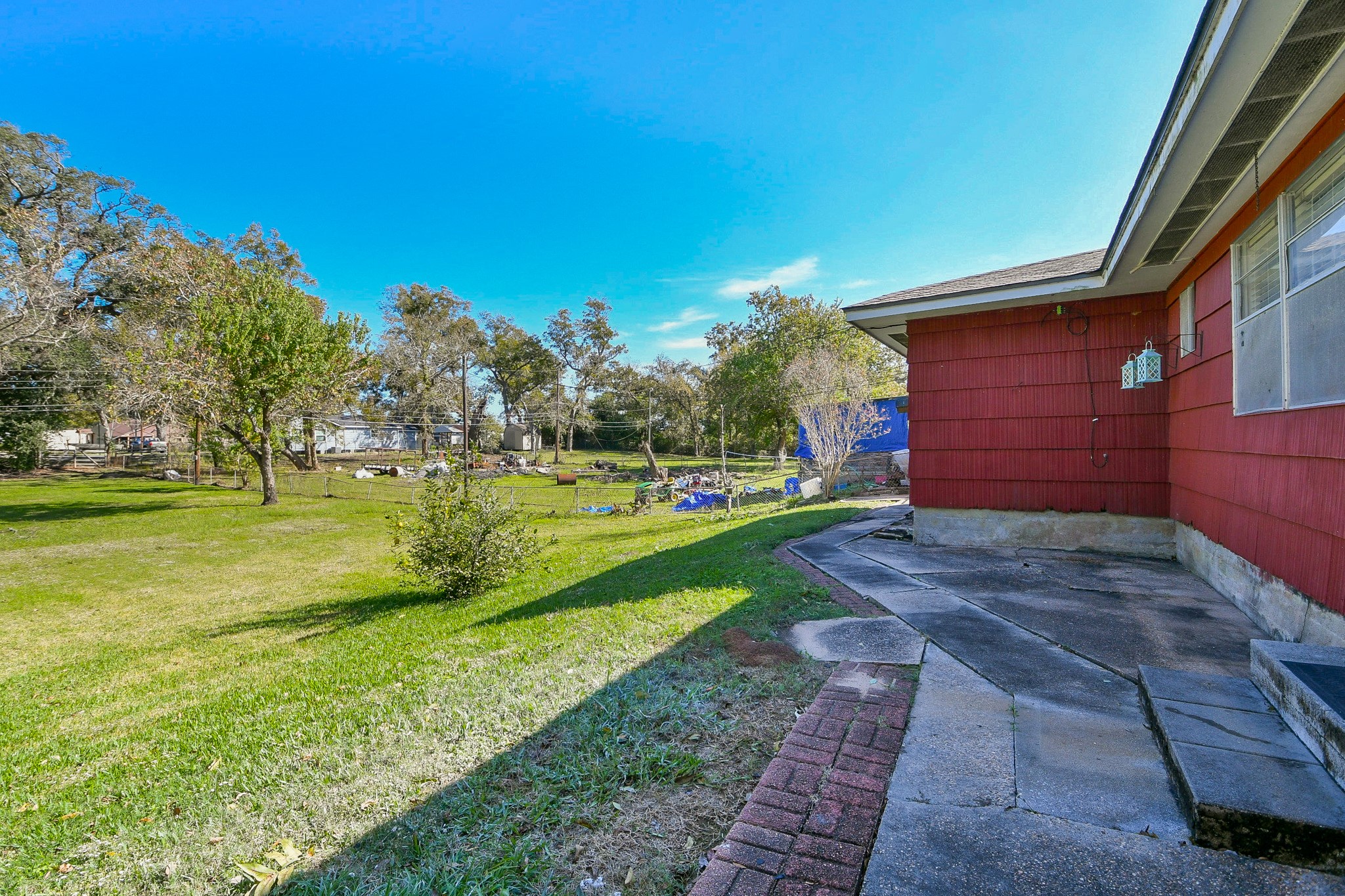129 Cannon Street Clute, TX 77531 - Photo 24 of 28 a view of a park with large trees
