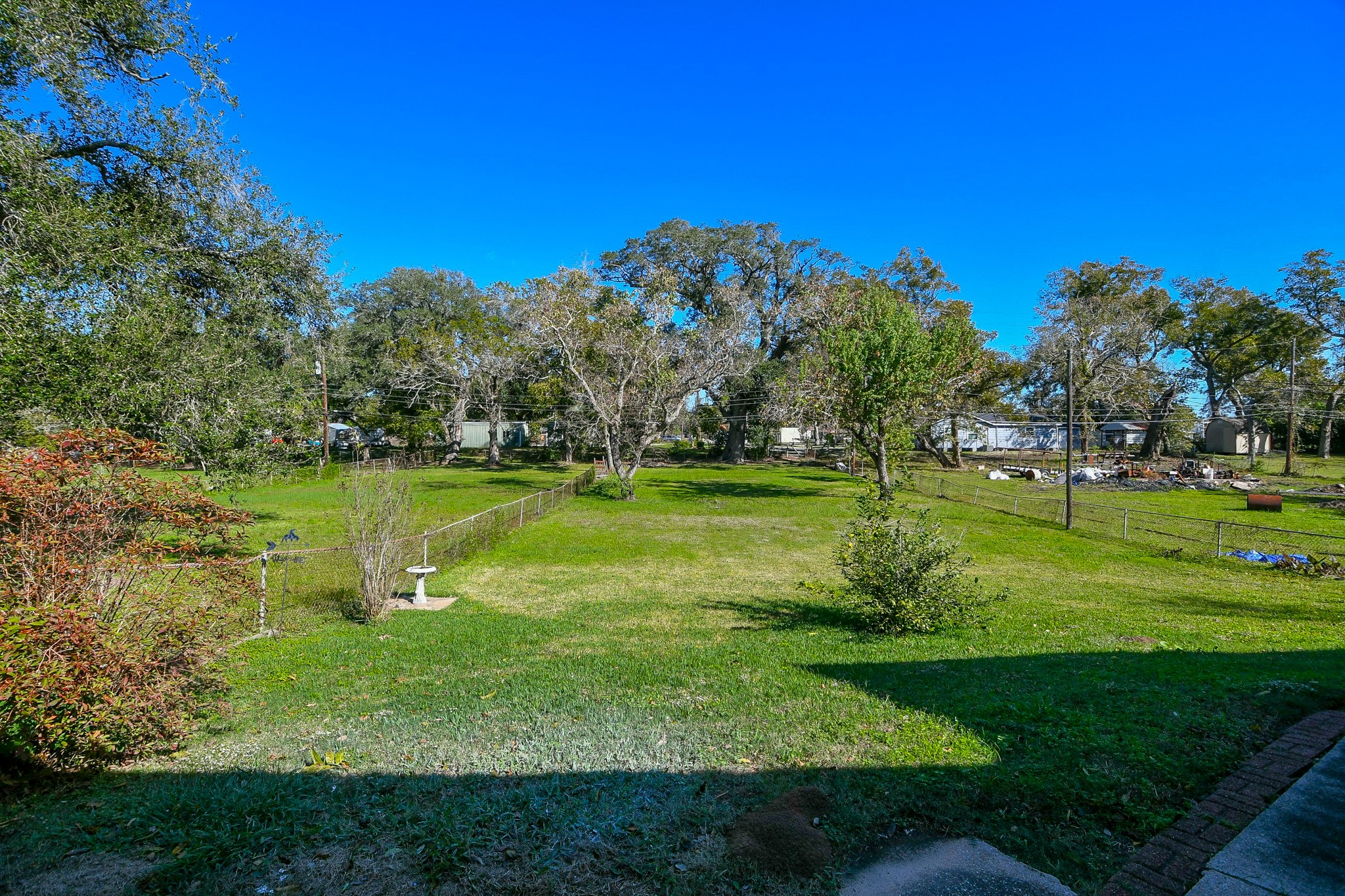 129 Cannon Street Clute, TX 77531 - Photo 28 of 28 a view of a golf course with a lake