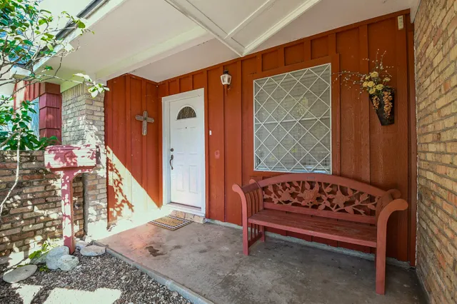 a view of a wooden bench in balcony
