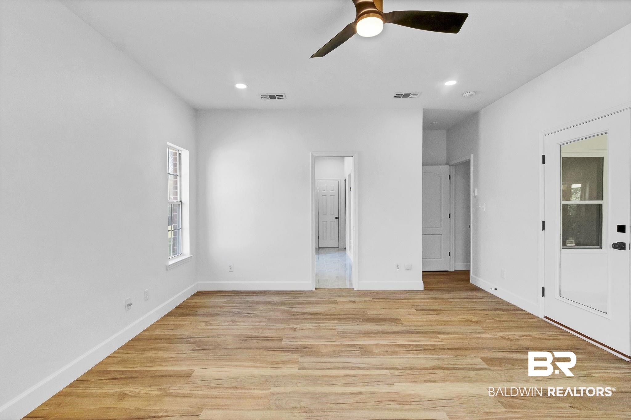 20265 Erin Pond Road Seminole, AL 36574 - Photo 27 of 97 Unfurnished bedroom featuring recessed lighting, baseboards, light wood-style floors, and visible vents