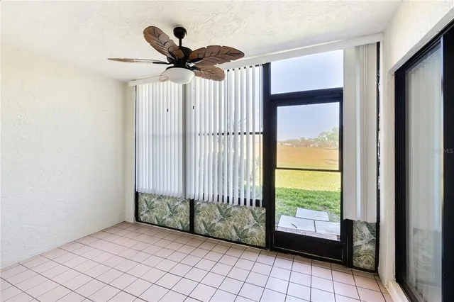 a view of an empty room and window