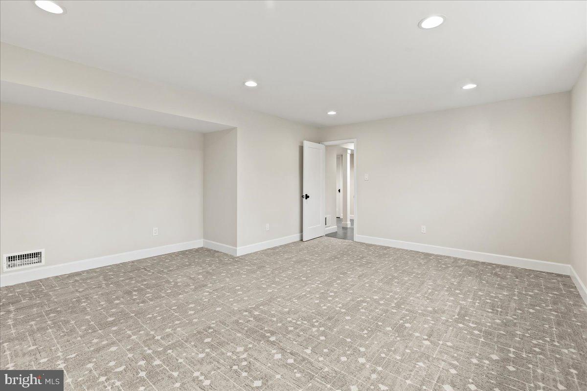 8317 Fort Hunt Road Alexandria, VA 22308 - Photo 28 of 36 New Carpet in lower level family room