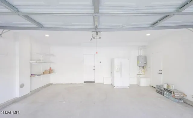 a view of a room with cabinet and a window