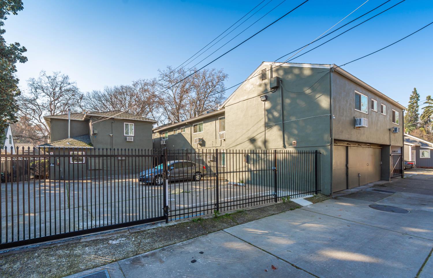2811 F Street Sacramento, CA 95816 - Photo 17 of 22 a view of a small yard and a garage