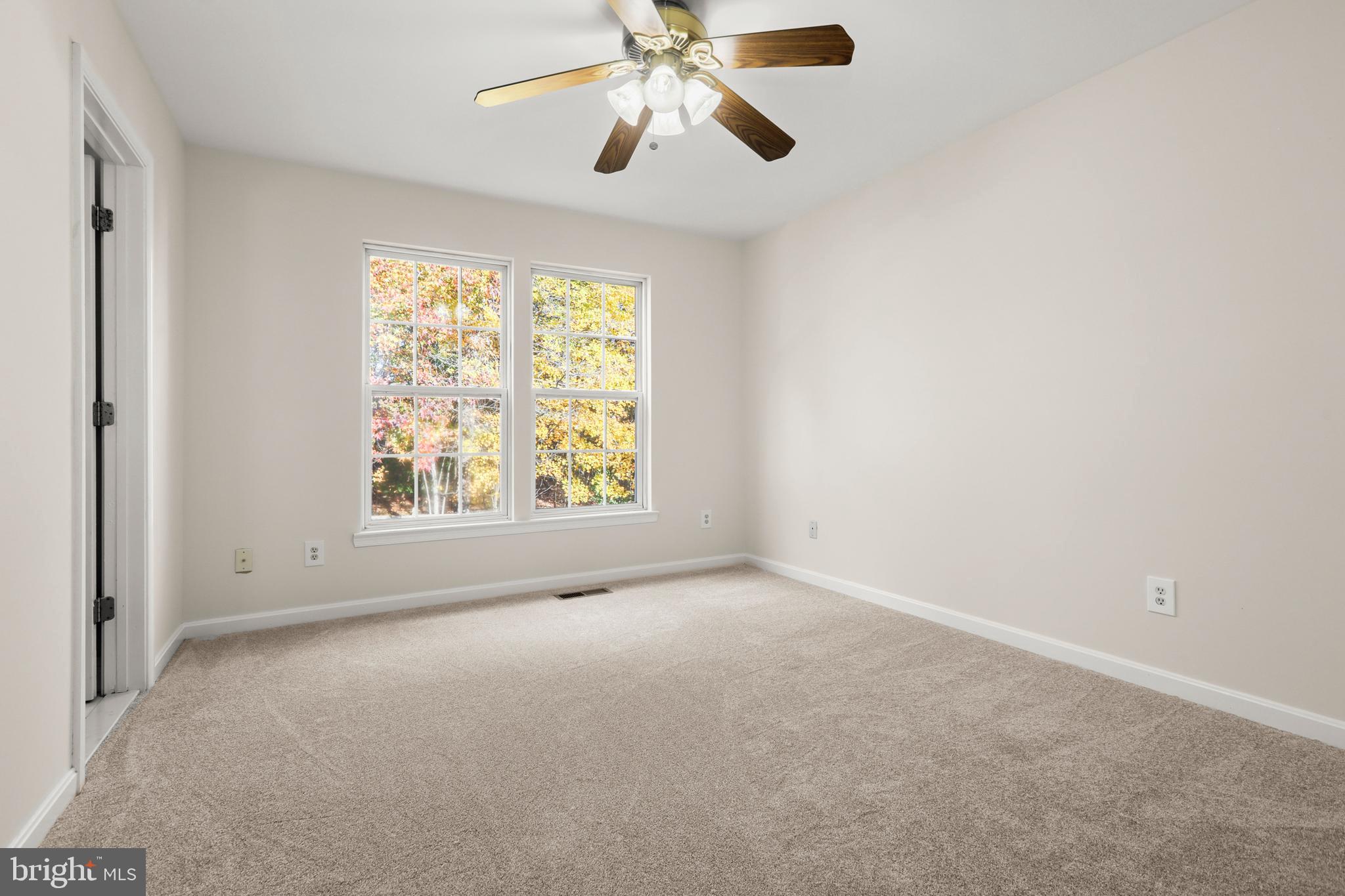 2826 Profitt Path Edgewood, MD 21040 - Photo 20 of 50 an empty room with windows and fan