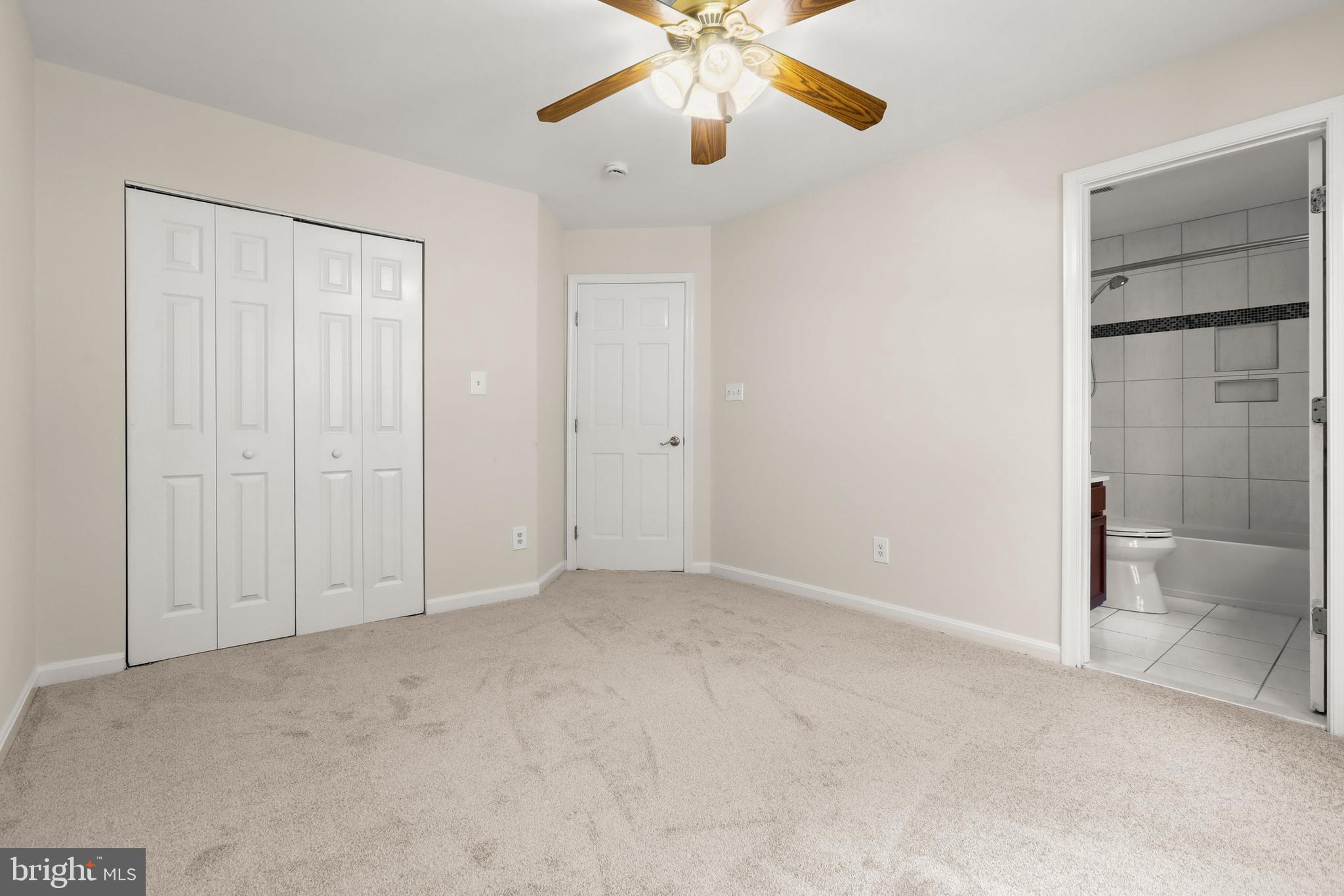 2826 Profitt Path Edgewood, MD 21040 - Photo 21 of 50 an empty room with closet and a chandelier fan