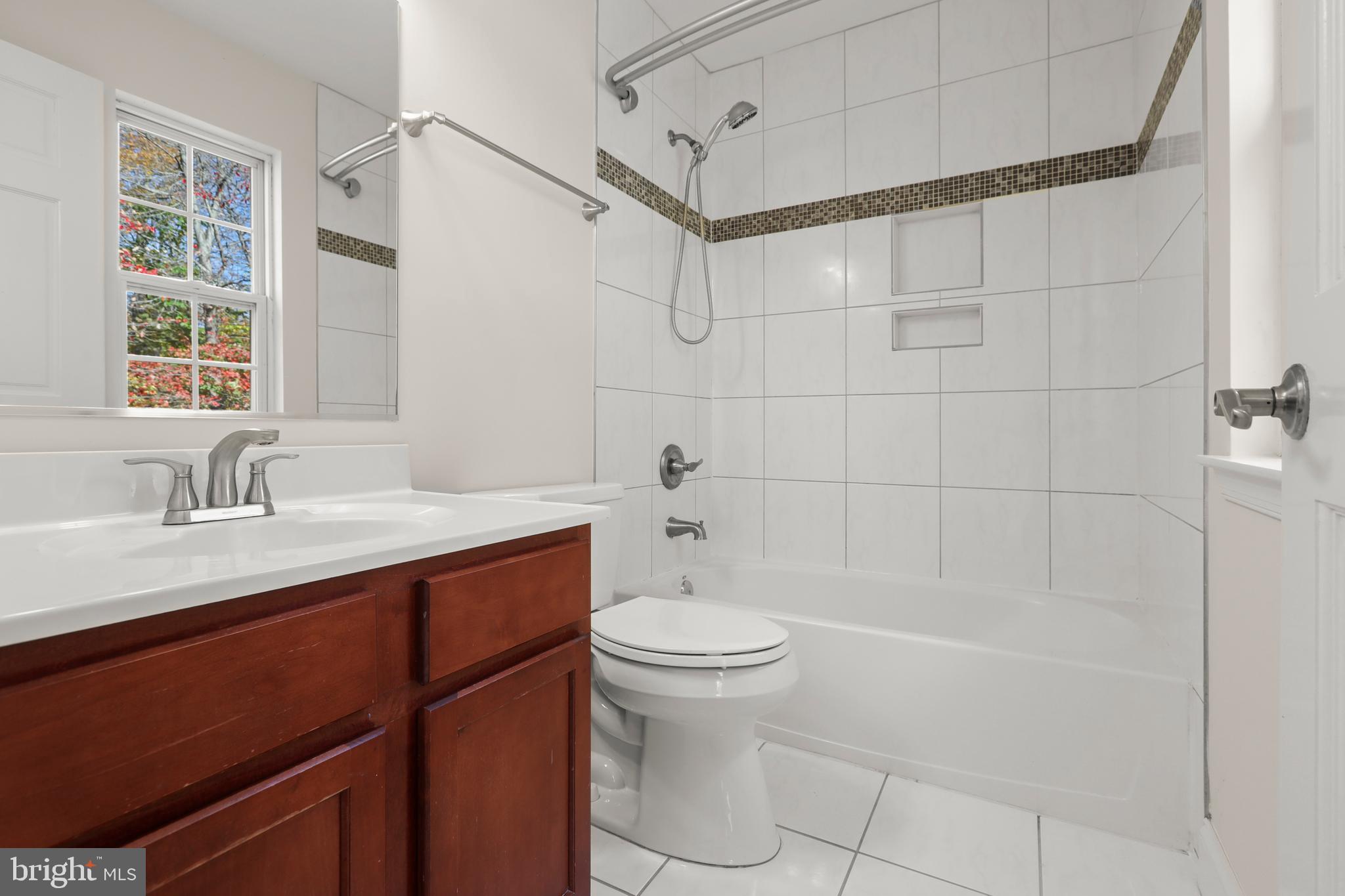 2826 Profitt Path Edgewood, MD 21040 - Photo 23 of 50 a bathroom with a sink a toilet and shower