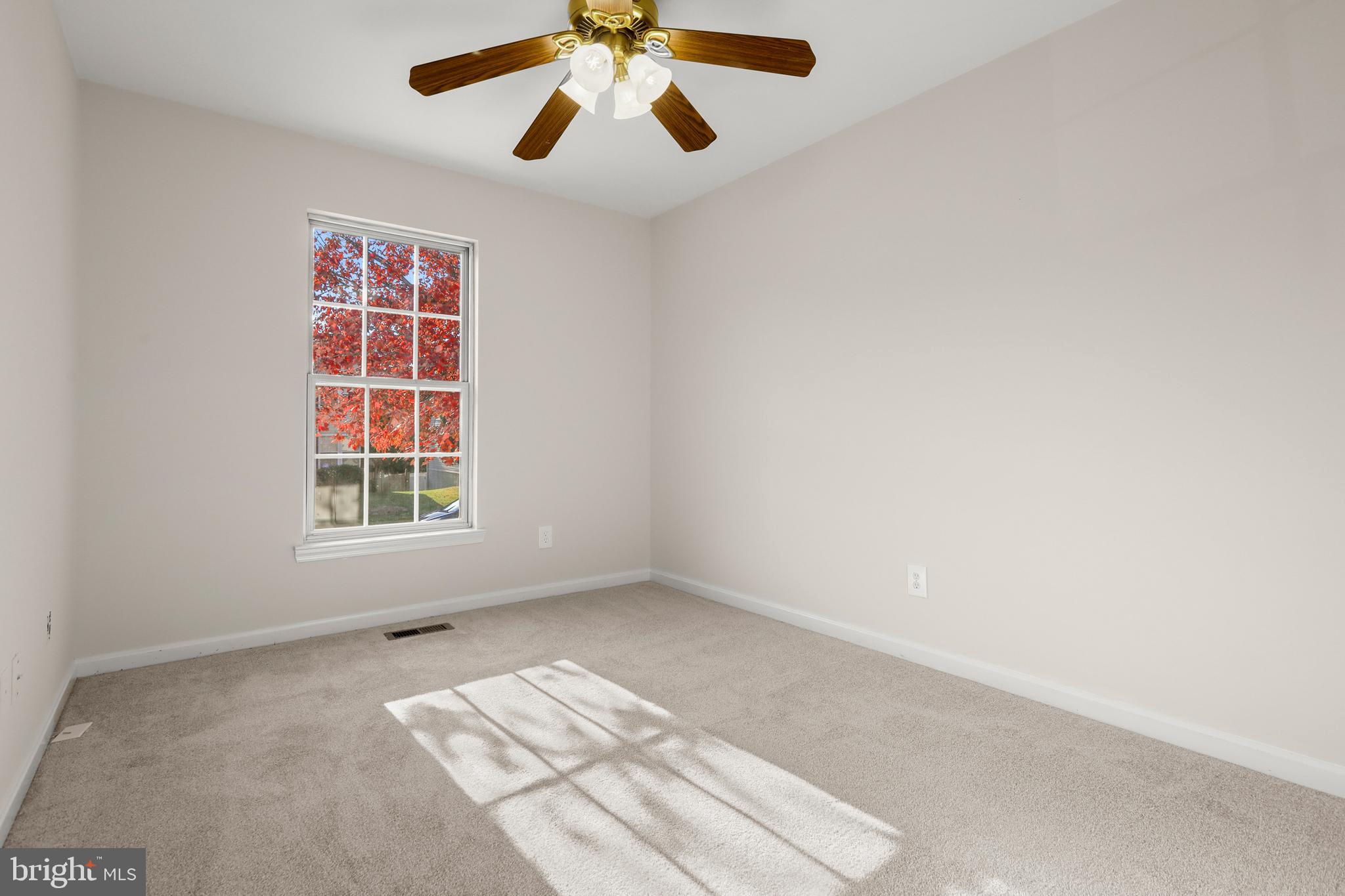 2826 Profitt Path Edgewood, MD 21040 - Photo 24 of 50 an empty room with windows and fan