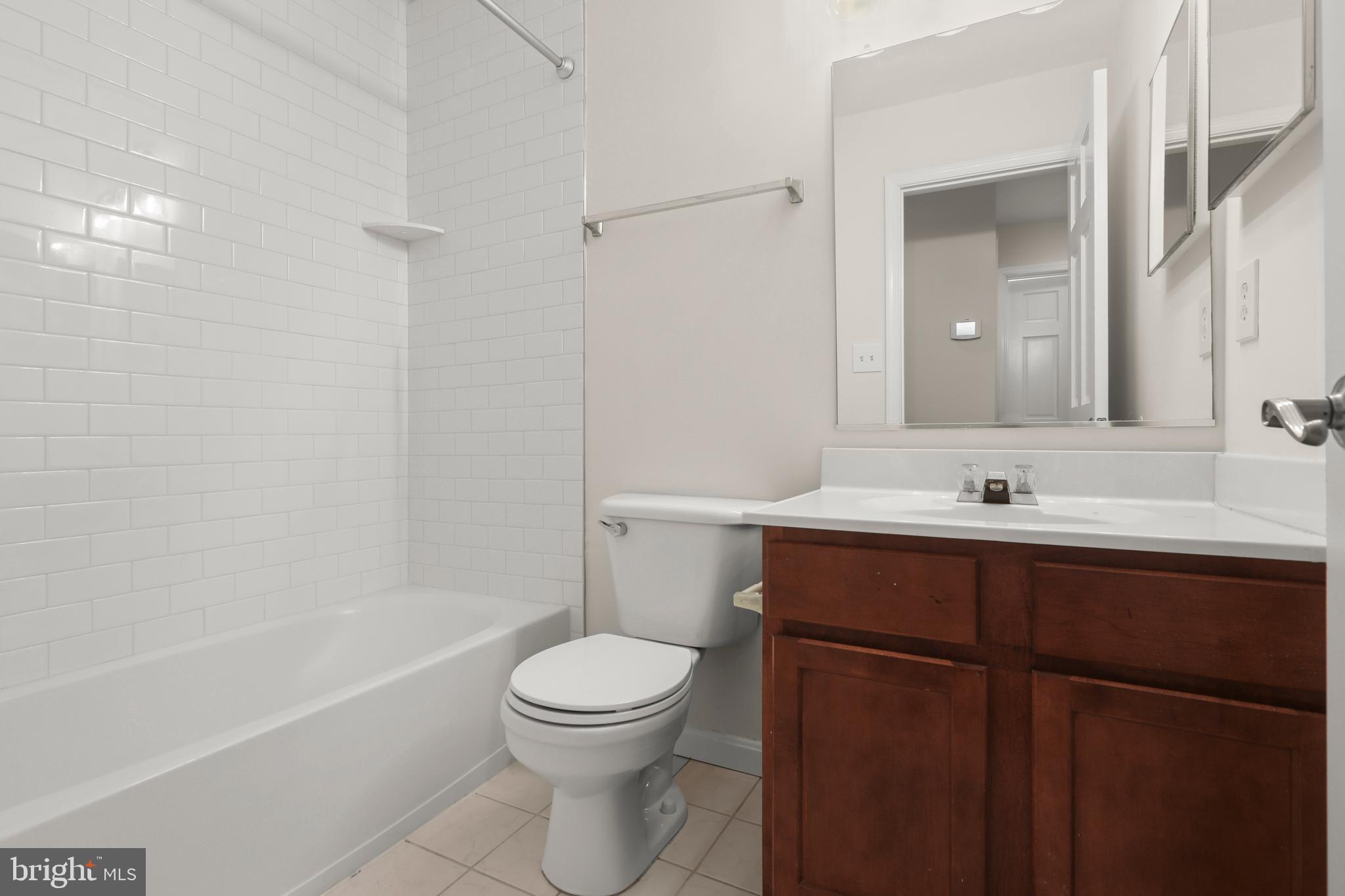 2826 Profitt Path Edgewood, MD 21040 - Photo 28 of 50 a bathroom with a sink a toilet and shower