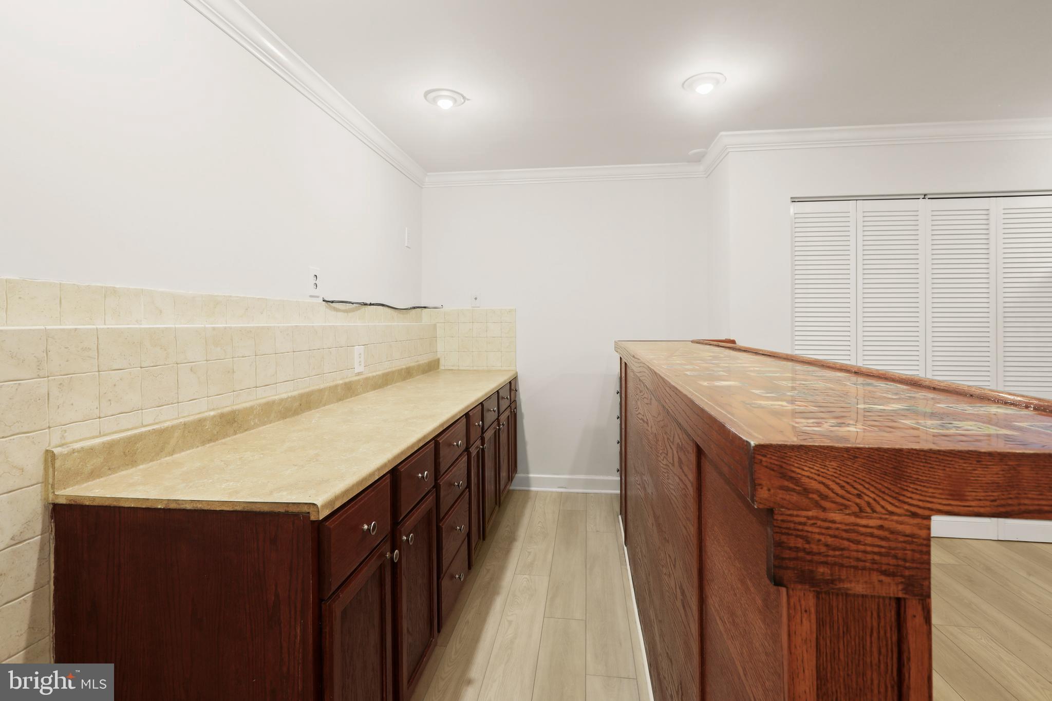 2826 Profitt Path Edgewood, MD 21040 - Photo 41 of 50 a kitchen with a sink and cabinets