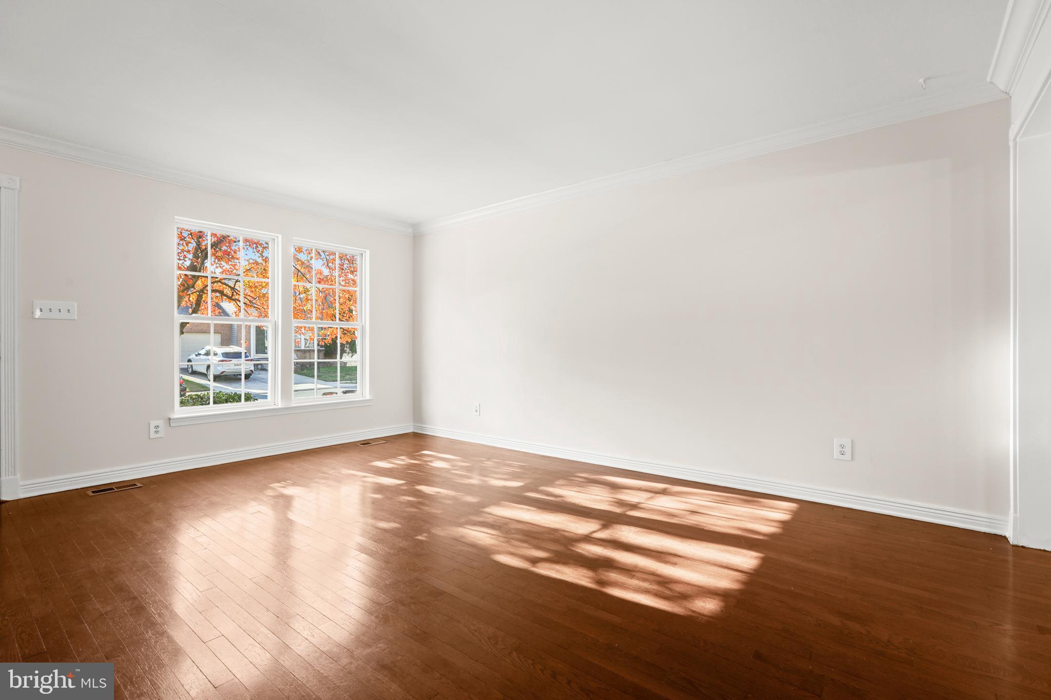 2826 Profitt Path Edgewood, MD 21040 - Photo 6 of 50 a view of an empty room with wooden floor and a window