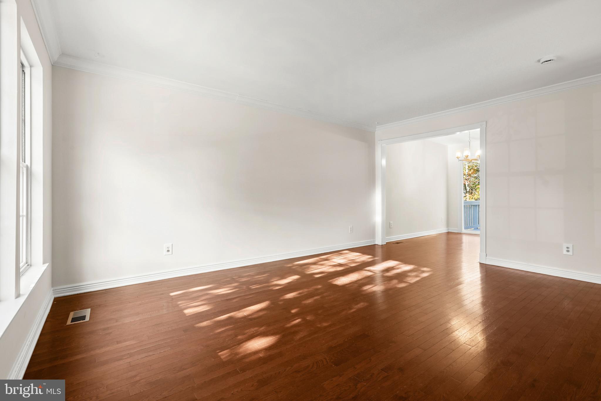 2826 Profitt Path Edgewood, MD 21040 - Photo 7 of 50 a view of an empty room with wooden floor and a window