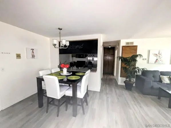 a kitchen with a refrigerator sink and microwave